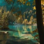 Blue water and colorful trees at Blausee in fall