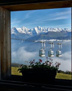 The NIederhorn gondolas with Eiger, Mönch and Jungfrau in the background