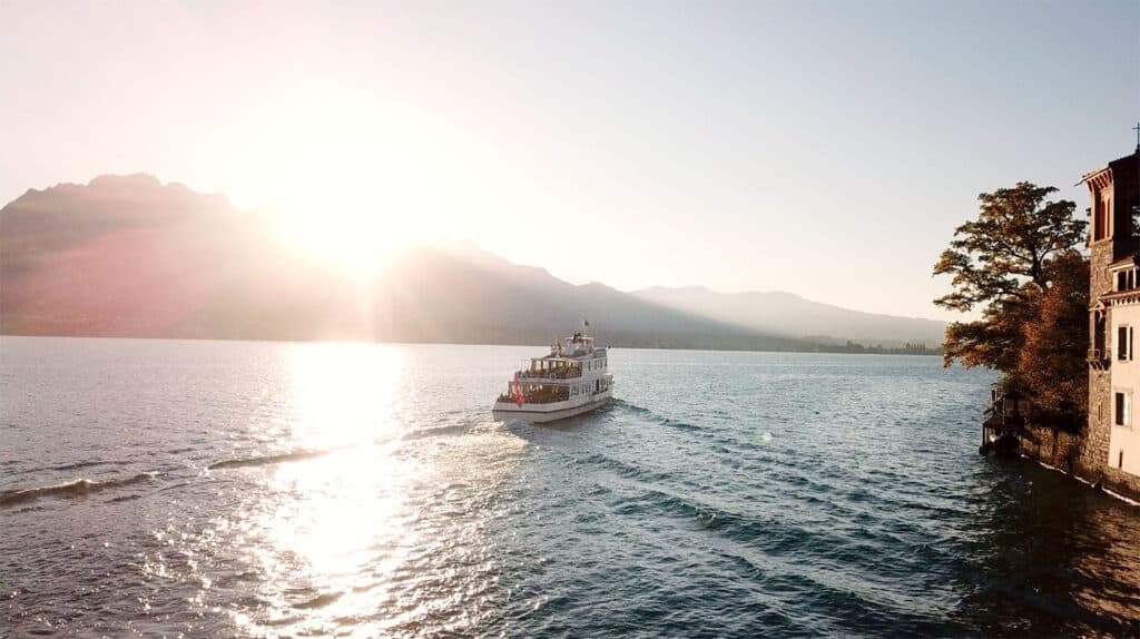 Sunset cruise ship on Lake Thun