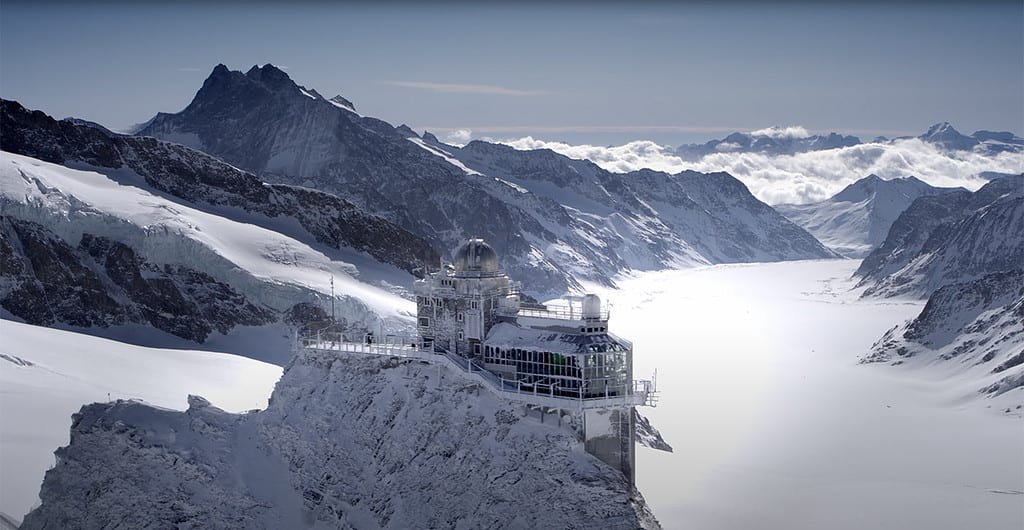 the sphynx observatory at jungfraujoch in front of the great aletsch glacier